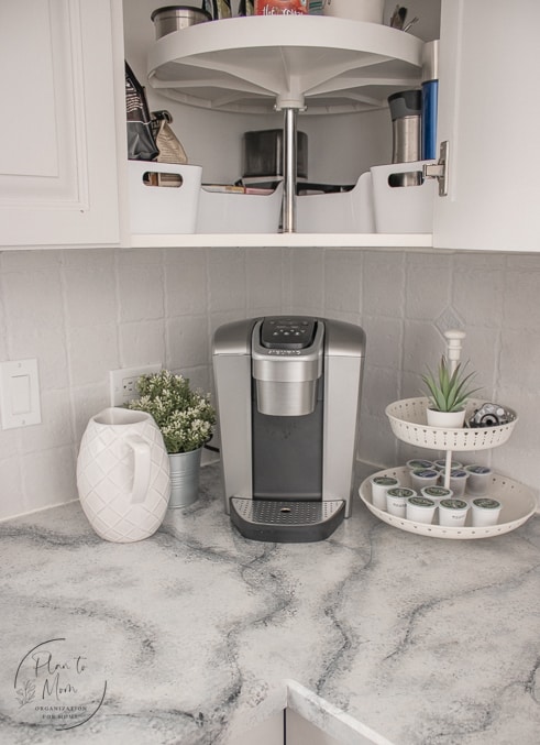 keurig machine and decor on countertop in kitchen